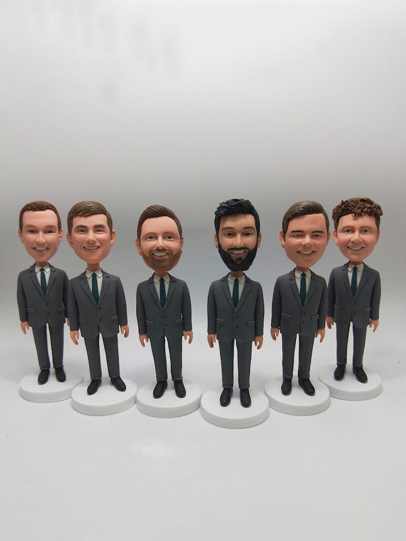 Custom bobblehead dolls, personalized clay figurine gifts